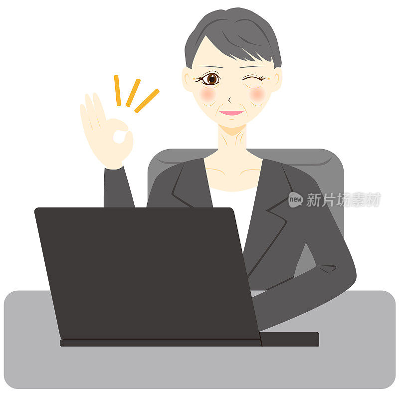 Middle aged woman using computer. OK sign.